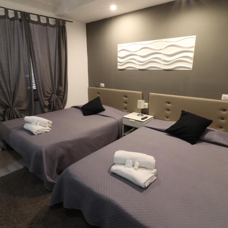 Guest House Minas - Quadruple Room with Private Bathroom - 8