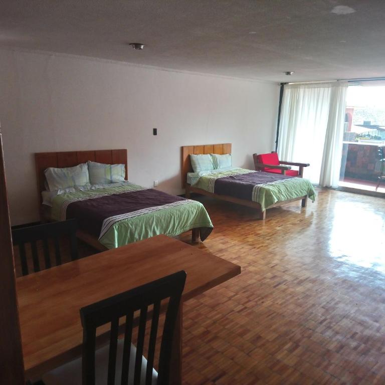 Suites Las Plazas - Apartamento con balcón - 1