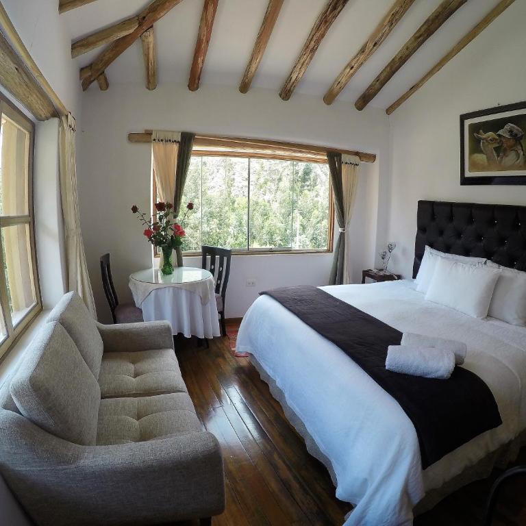 Parwa Guest House - Habitación con cama extragrande y baño privado - 2