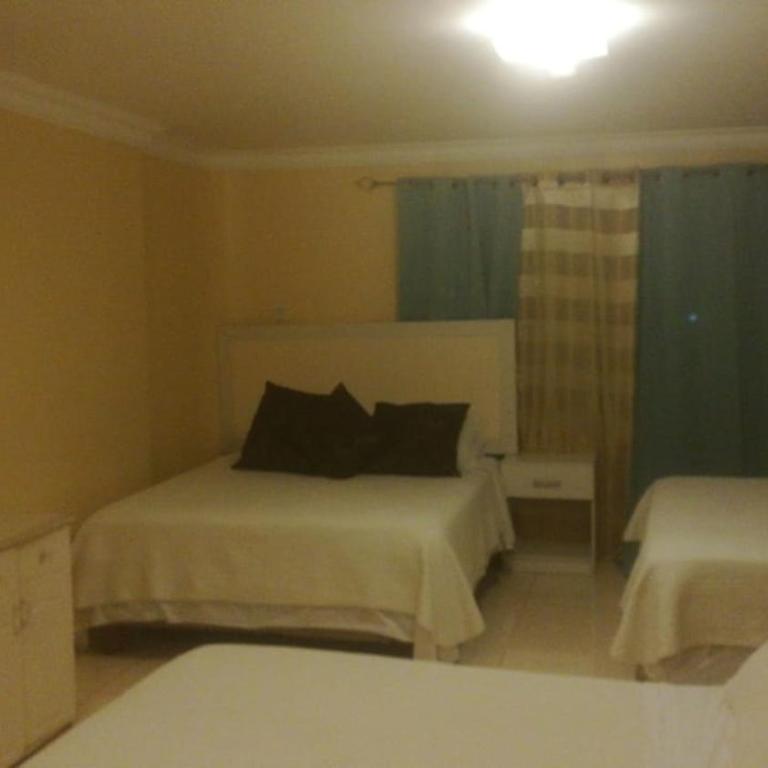 Suites La Rosa - Family Room - 2