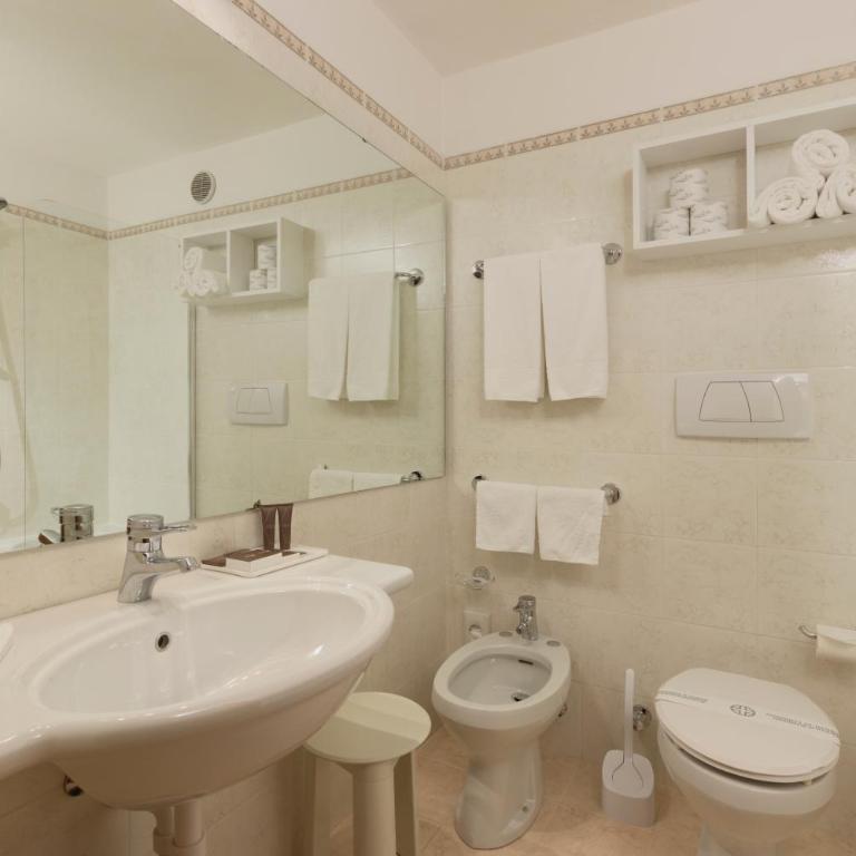 Style Hotel Grifone - Camera Tripla - 9