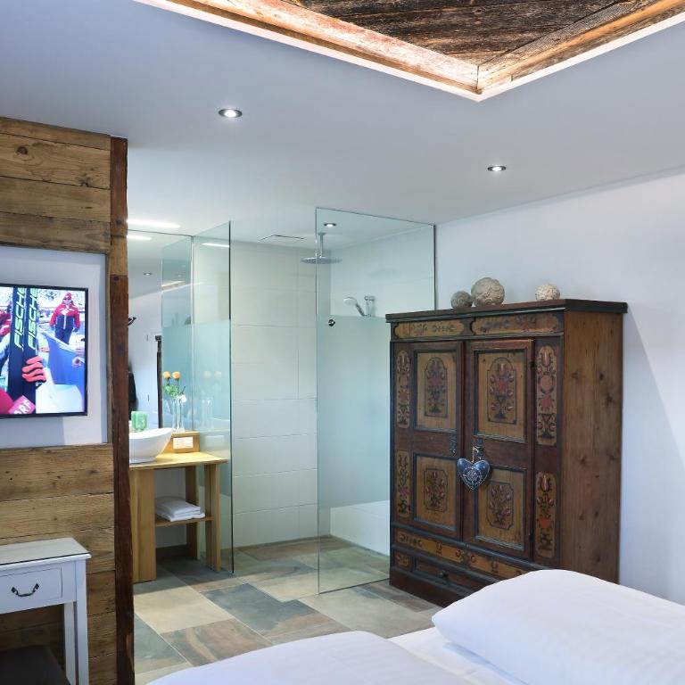 Landschützer's Country Suites - Deluxe Suite mit Whirlpool-Badewanne - 10