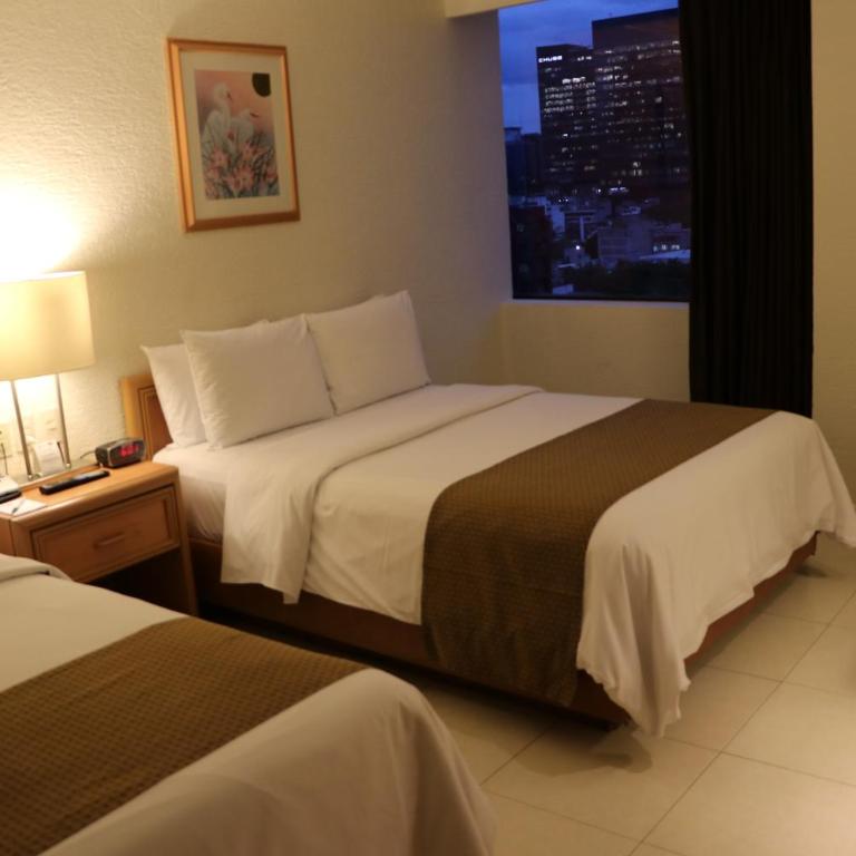 Hotel PF - Habitación Doble Estándar con 2 camas dobles - 1