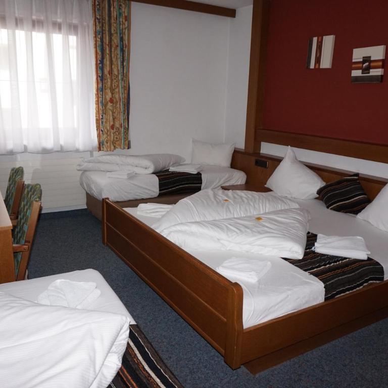 Hotel Untermetzger - Comfort Vierbettzimmer - 17