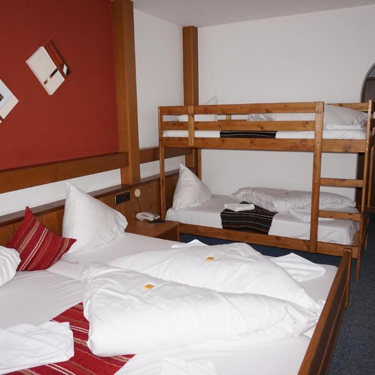 Hotel Untermetzger - Comfort Vierbettzimmer - 16