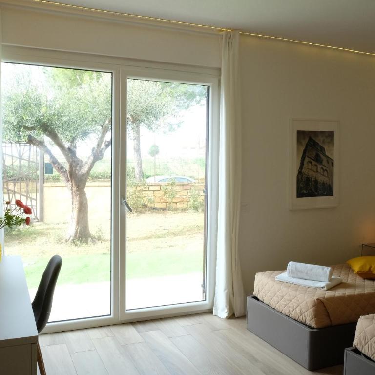 Locanda Degli Scrittori - Camera Tripla con Vista Giardino - 1