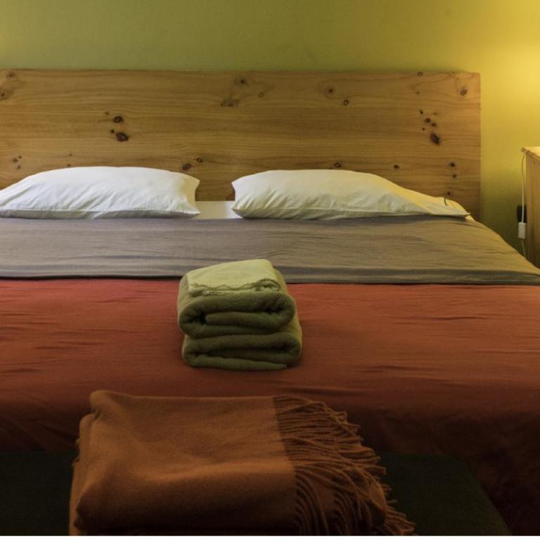 Casa Nuestra Peru - Habitación con cama extragrande. - 1
