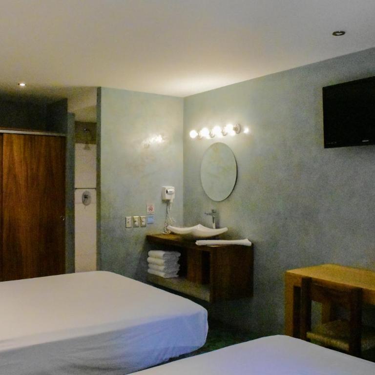 Hotel Rio Malecon - Habitación Cuádruple Deluxe - 4