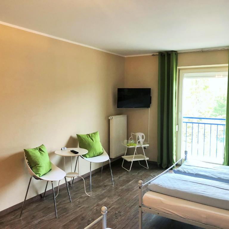 Motel Füssen im Allgäu - Vierbettzimmer mit Dusche - 1