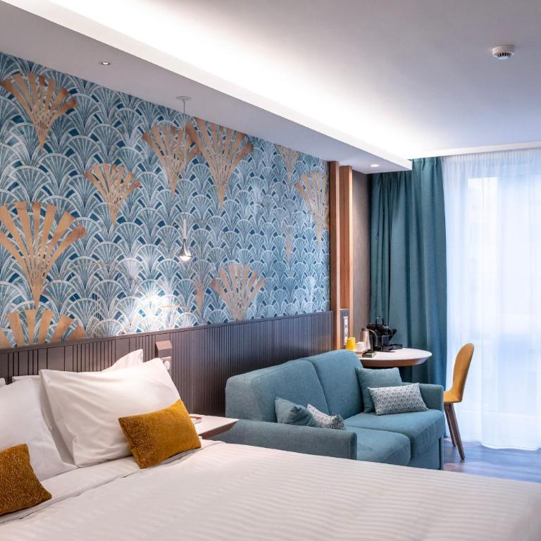 voco Strasbourg Centre - The Garden by IHG - Camera Queen Premium con Divano-Letto - 8