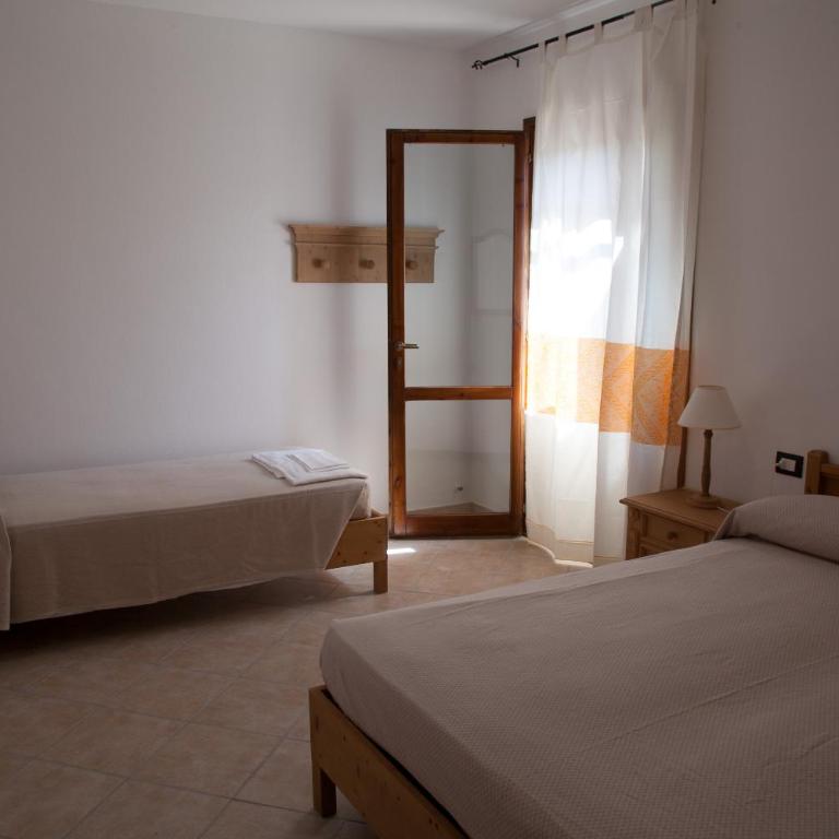 Residence Hotel Monte Ricciu Nuova Gestione - Camera Quadrupla - 8