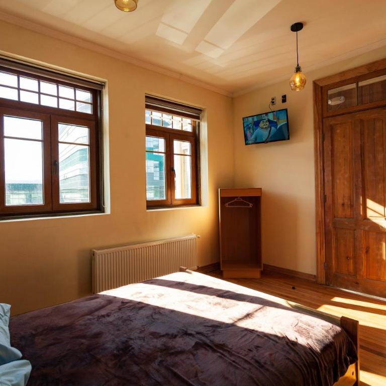 Hostal Boutique Patagonia Mística - Habitación Cuádruple con baño privado - 3