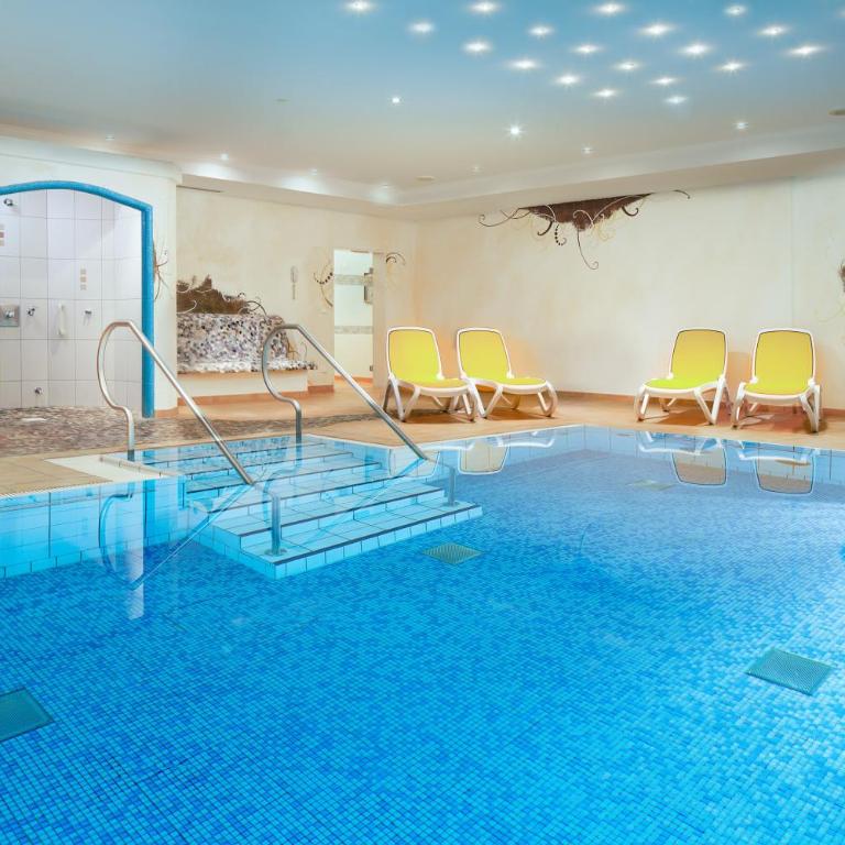 "Haus Enzian" - Annehmlichkeiten von 4-Sterne Familien-und Wellnesshotel Viktoria können mitgenutzt werden - Apartment mit 1 Schlafzimmer - 5