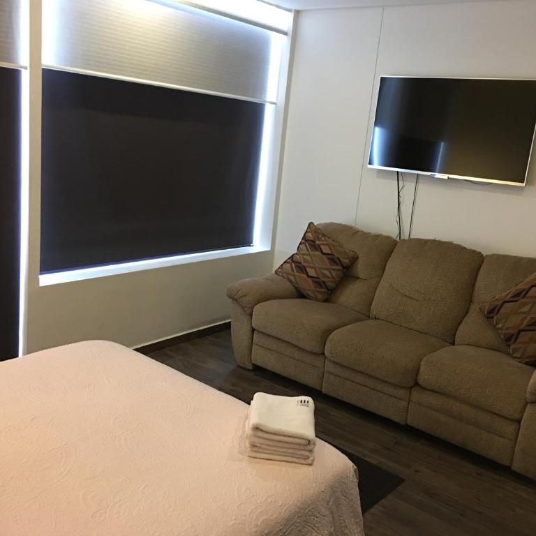 Napoles Condo Suites - Deluxe Double Room with Balcony - 19