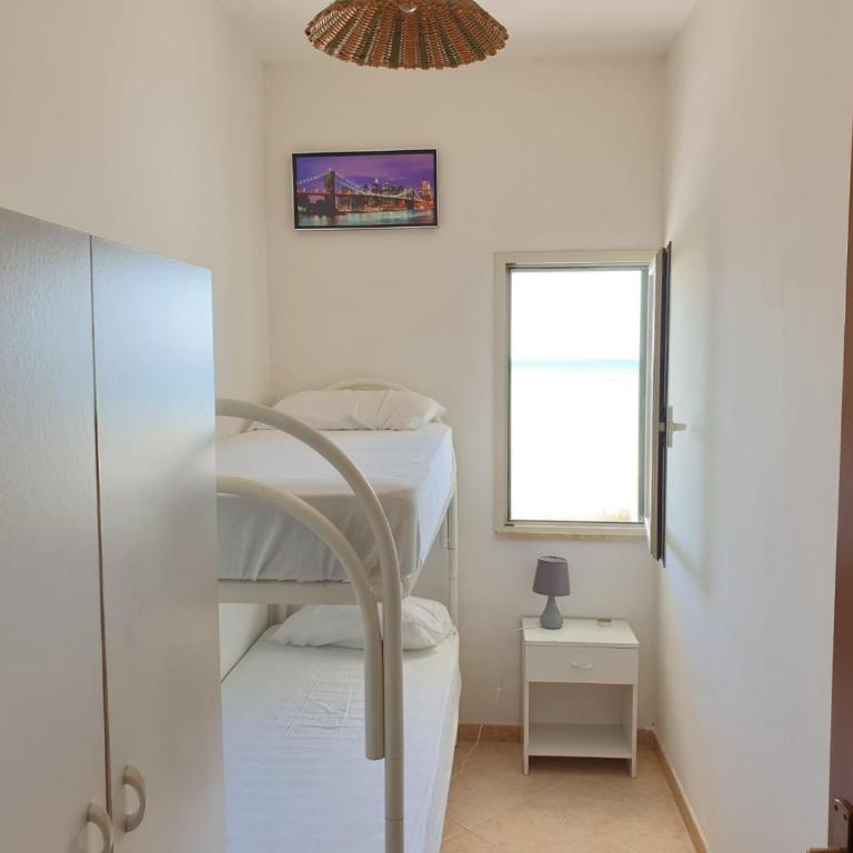 Appartamenti La Spiaggia - Casa con 2 Camere da Letto - 1° Piano - 4