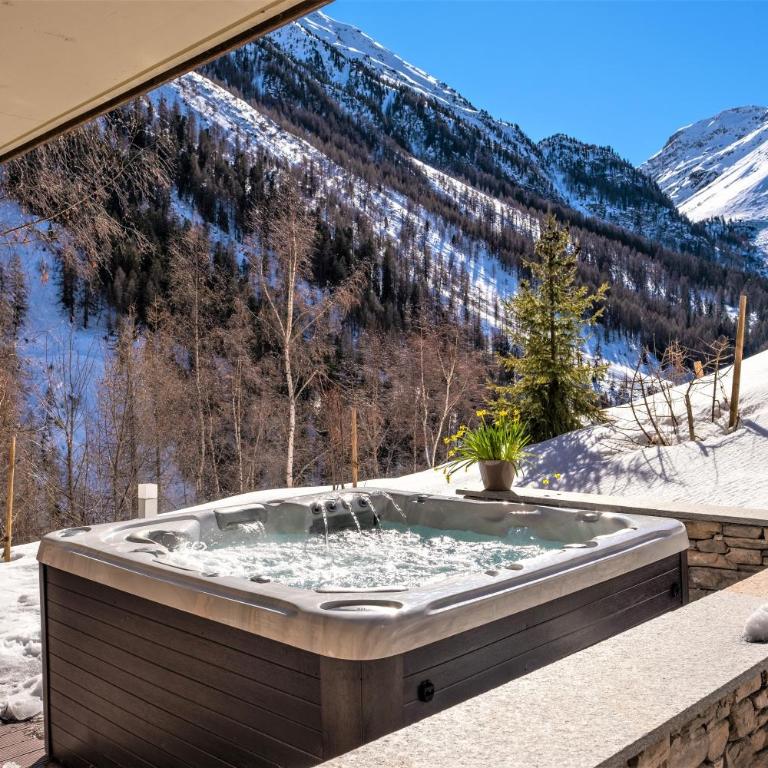 Chalet Les Rahâs by Mrs Miggins - Superior Apartment mit Whirlpool - 1