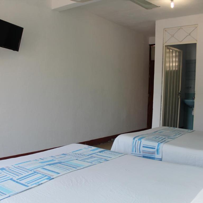 Hotel Carruiz - Habitación Doble Deluxe - 2 camas - 4
