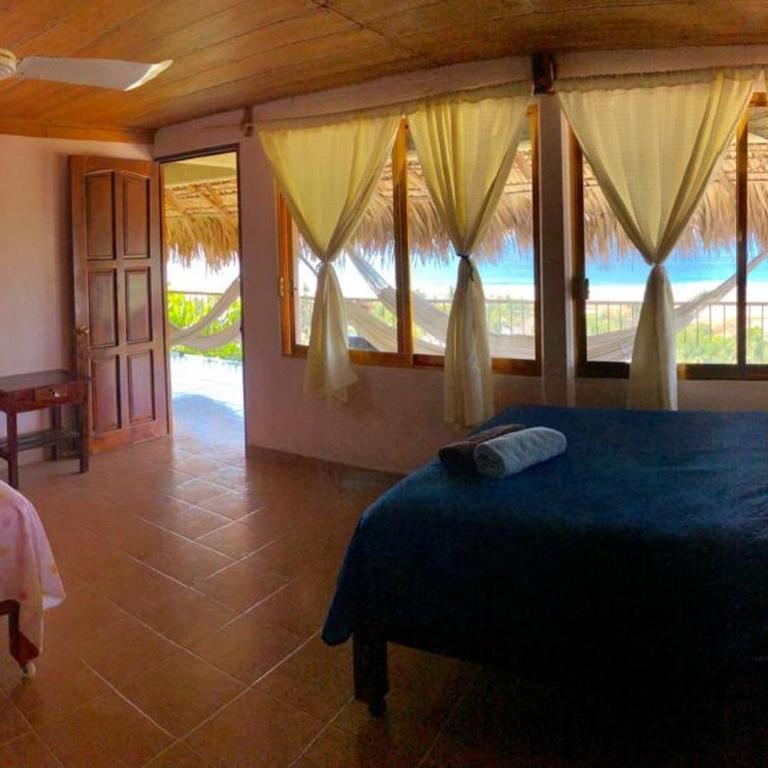 Ananda Guest House Yoga & Meditación - Habitación Cuádruple con vistas al mar - 16