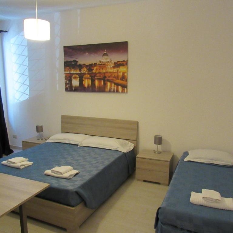 PIANETA ROMA 39 - Camera Matrimoniale Deluxe con 1 Letto Supplementare - 1