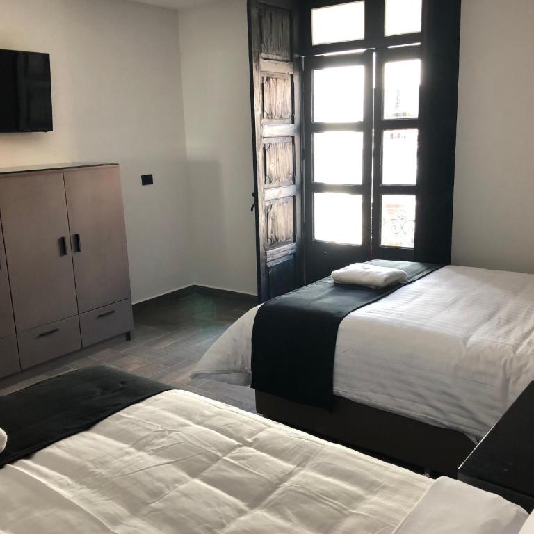 Hotel Isabel - Habitación Doble - 2 camas - 4