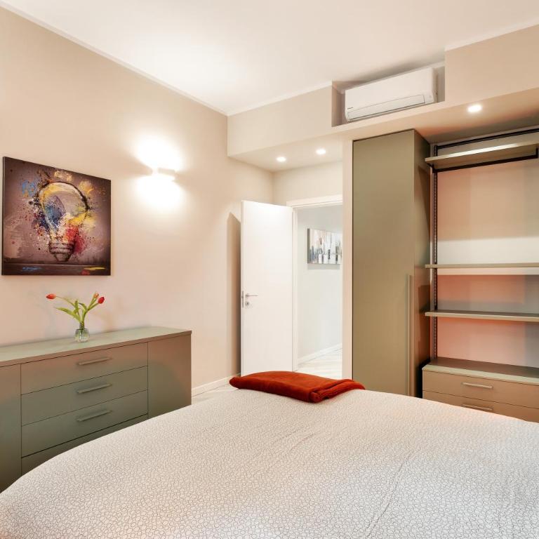 GuestHost - Maggiore Residence Flats - Appartamento con 1 Camera da Letto - 1