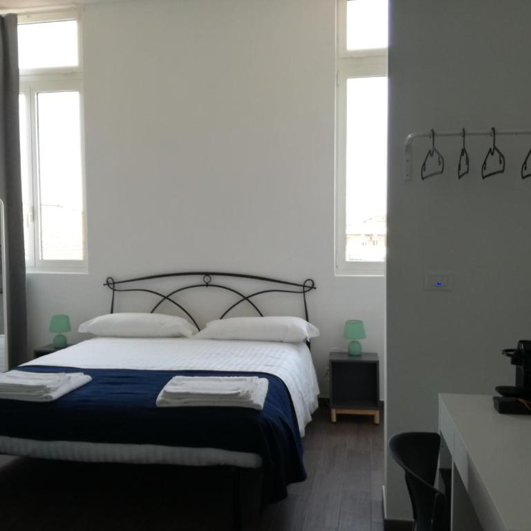 Mambo Suites - Quadruple Room with Private Bathroom - 4