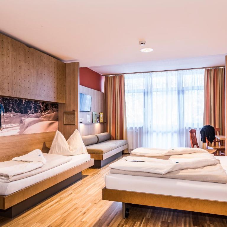 JUFA Hotel Altenmarkt-Zauchensee - Superior Dreibettzimmer - 4
