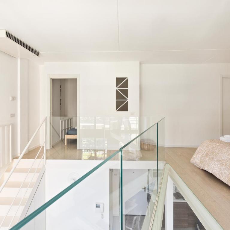 GuestHost - Elegant Loft with Balcony! - Loft - 6