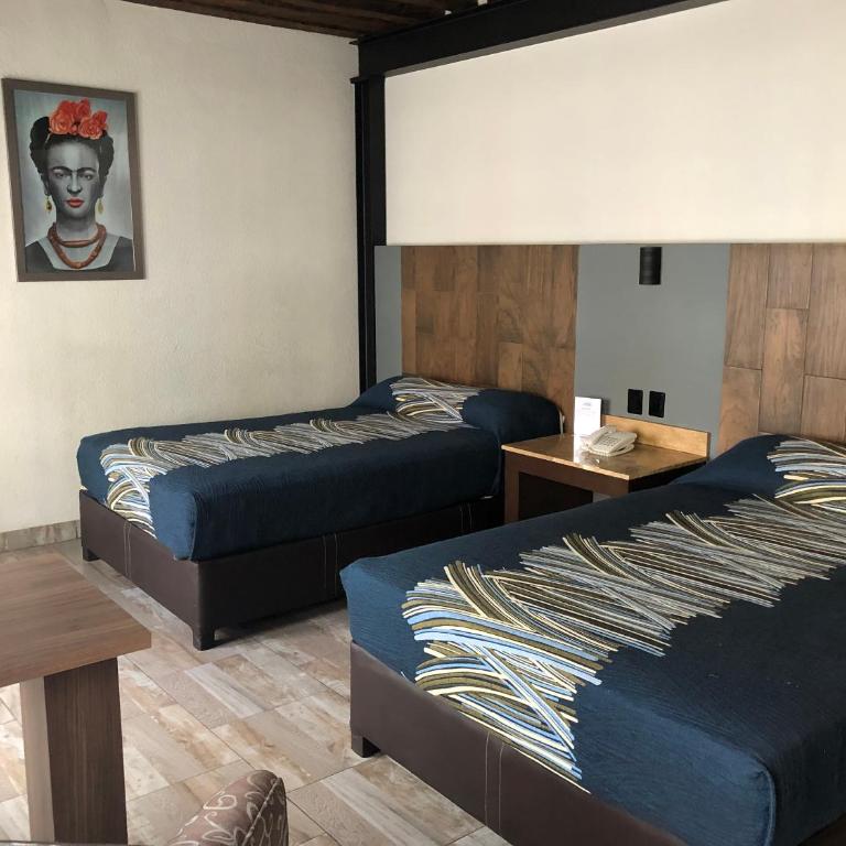 Hotel Frida - Habitación Doble - 2 camas dobles - 9