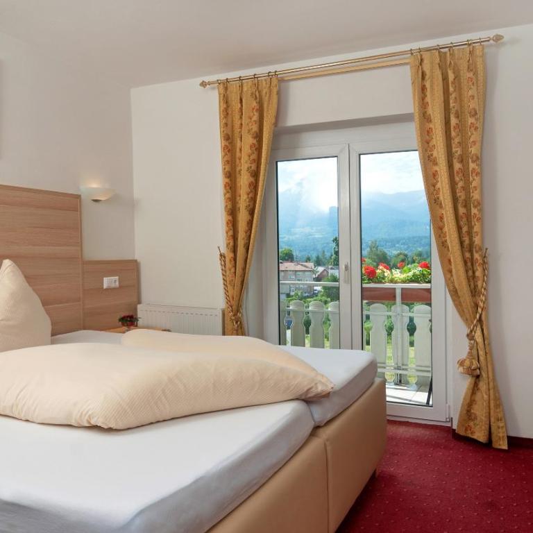 Hotel-Pension Melcher - Doppelzimmer mit Seeblick - 11