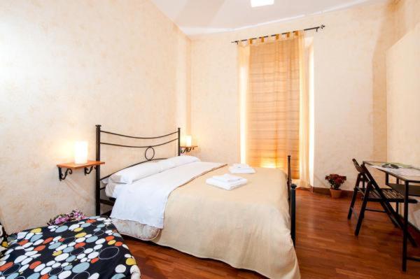 Residenza Laterano - Camera Tripla Basic con Bagno in Comune - 3