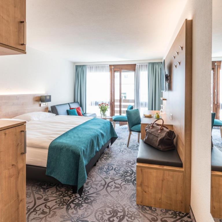 Central Sporthotel Davos - Superior Zimmer West mit Balkon - 2