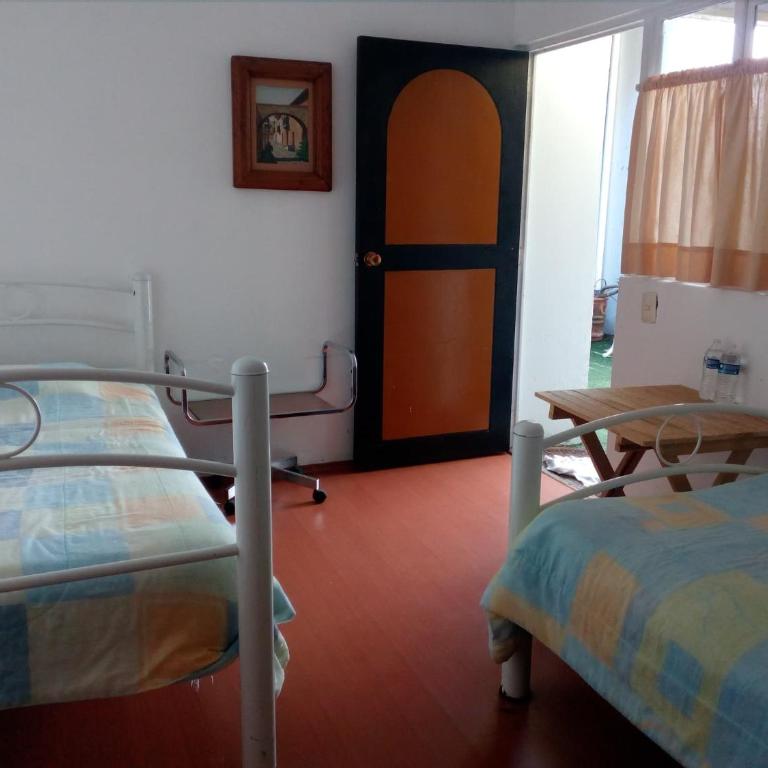 Hostal Cuija Coyoacan Berlin 268 Coyoacan - Chambre Lits Jumeaux avec Salle de Bains Privative - 1
