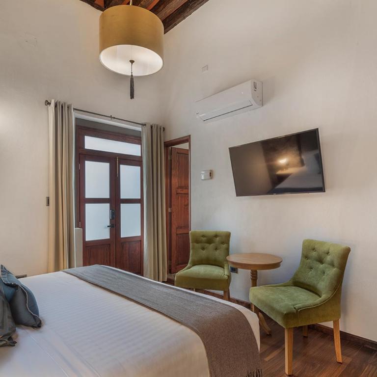 Hotel Casa Monarca - Habitación con cama extragrande. - 1