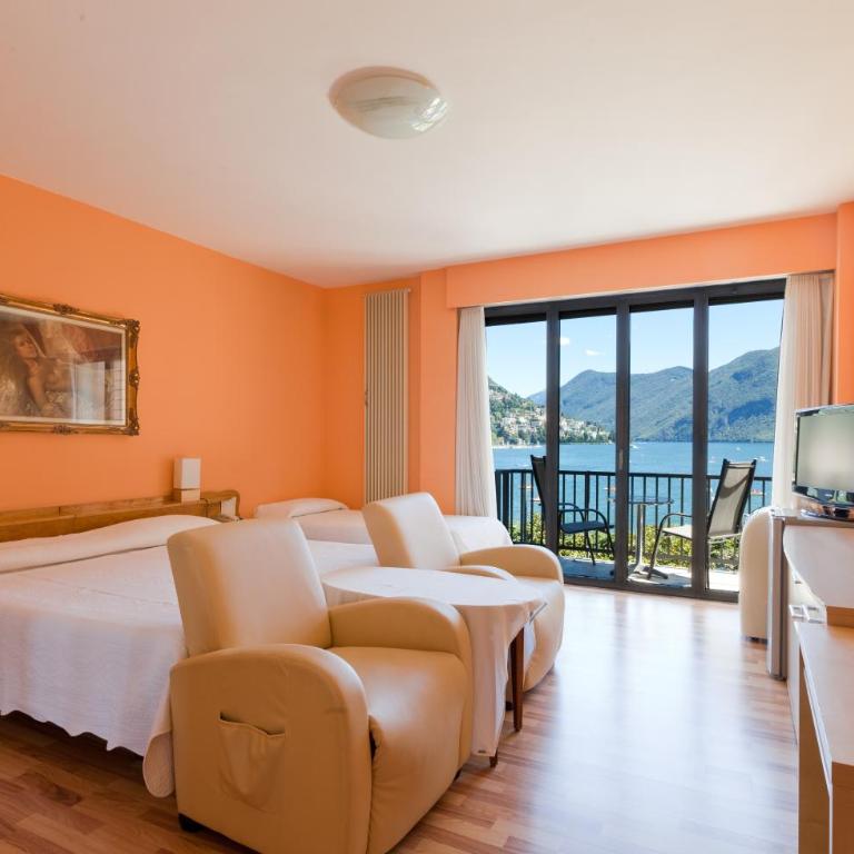 Swiss Lodge Nassa Garni - Camera Tripla Standard con Vista Lago e Balcone - 1