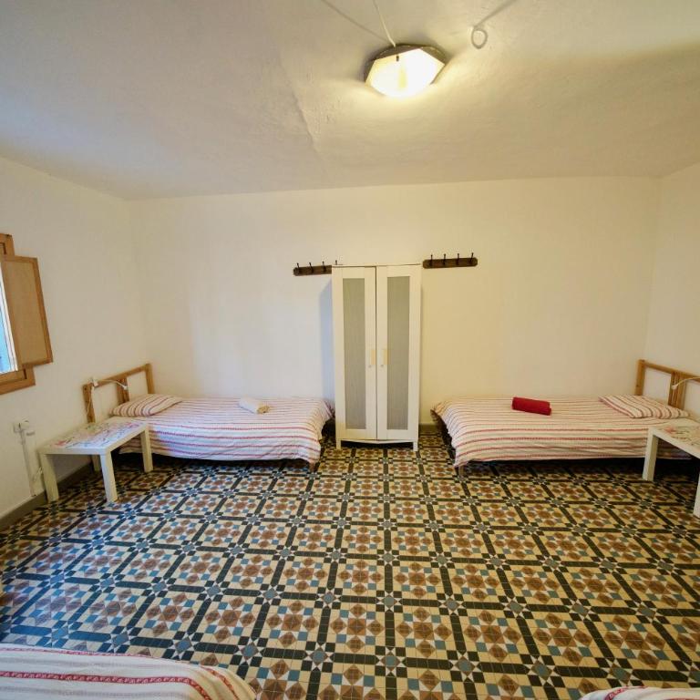 Sol y Mar Surf Camp - Cama en habitación compartida mixta compartido de 4 camas con baño compartido - 1