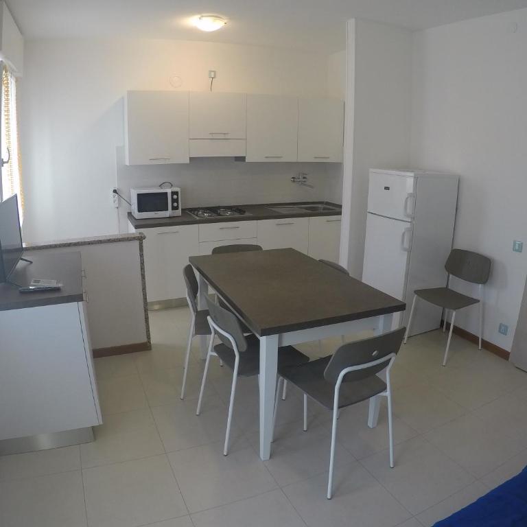 Appartamento Tintoretto - Agenzia Cocal - Appartamento con 2 Camere da Letto e Balcone - 1