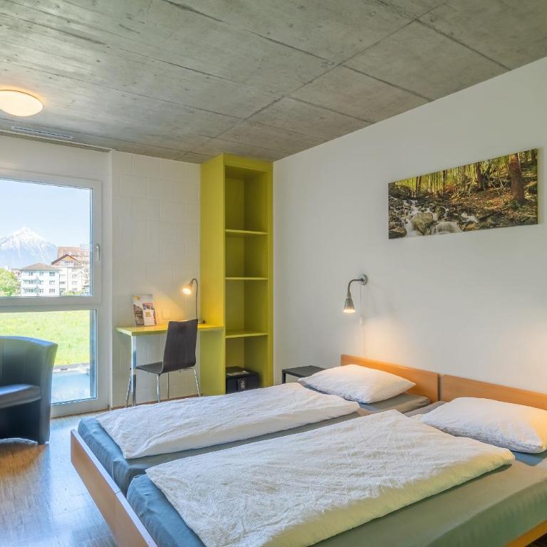 Backpackers Villa Sonnenhof - Hostel Interlaken - Zweibettzimmer - 4