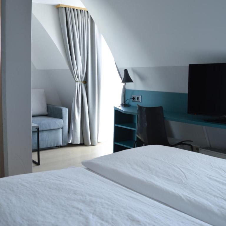 Pension Elisabeth - Rooms & Apartments - Superior Zimmer mit Gartenblick - 17