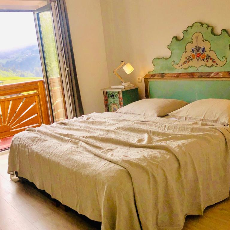 Hotel Sonnenhof - bed & breakfast & appartements - Dreibettzimmer mit Balkon - 12