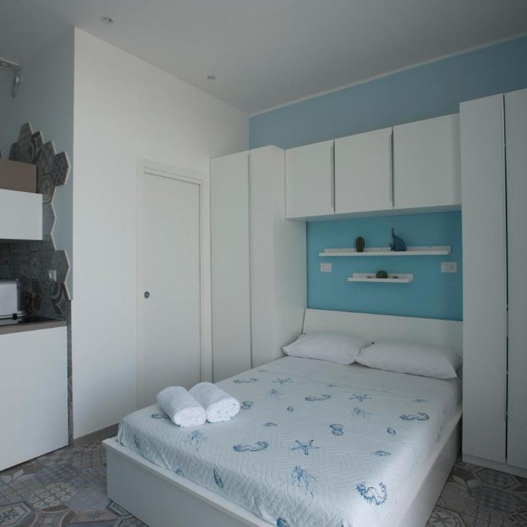 Nereidi Suites - Camera Deluxe Matrimoniale/Doppia con Letti Singoli con Vista Mare - 12