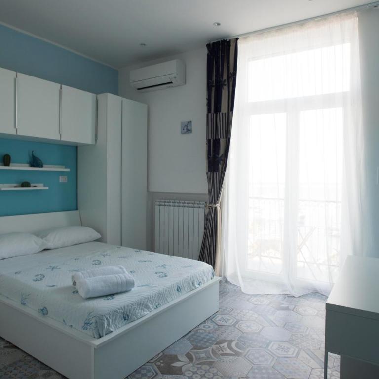 Nereidi Suites - Camera Deluxe Matrimoniale/Doppia con Letti Singoli con Vista Mare - 10