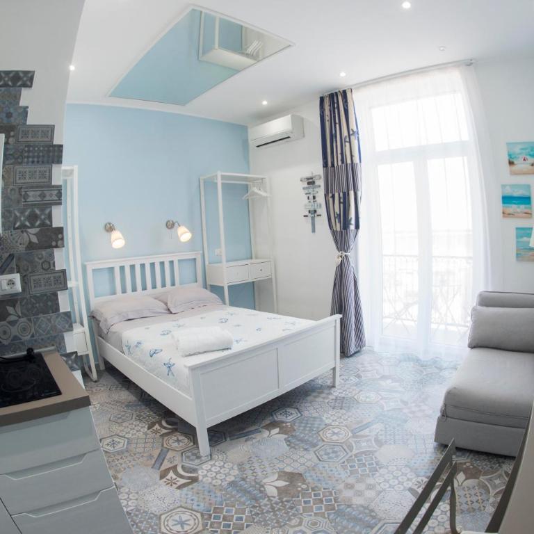 Nereidi Suites - Camera Matrimoniale Deluxe con Balcone e Vista Mare - 1