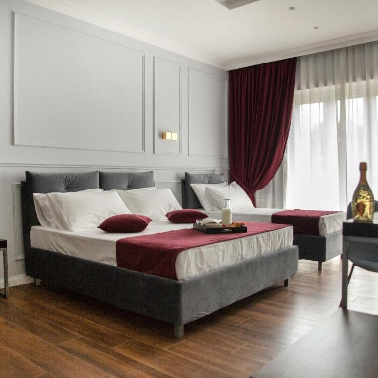 Unicum Roma Suites - Camera Matrimoniale Deluxe con Balcone - 1