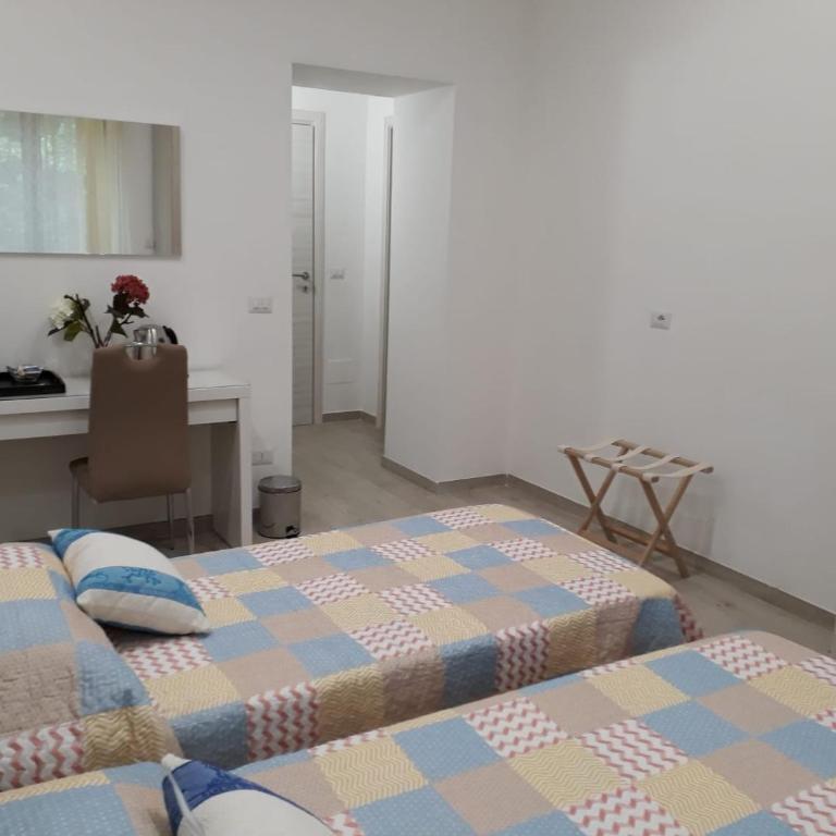 Rosa del Salento - Camera Doppia con Letti Singoli con Bagno Privato - 1