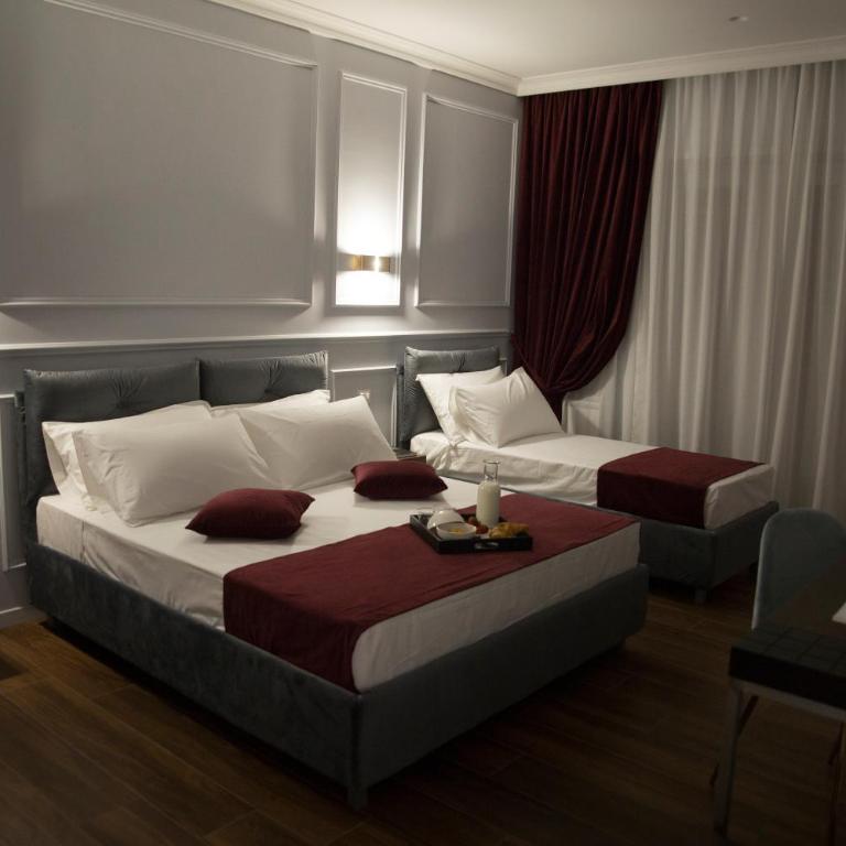 Unicum Roma Suites - Camera Matrimoniale Deluxe con Balcone - 7