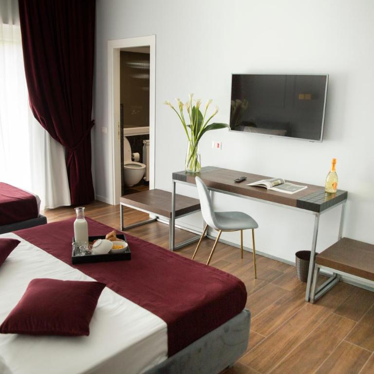 Unicum Roma Suites - Camera Matrimoniale Deluxe con Balcone - 10