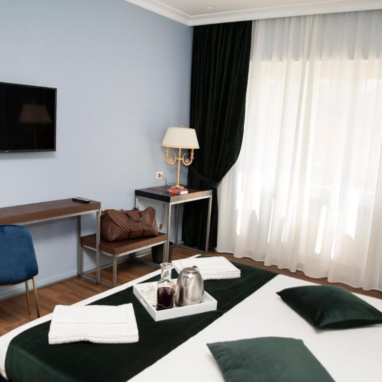 Unicum Roma Suites - Camera Matrimoniale Deluxe - 14