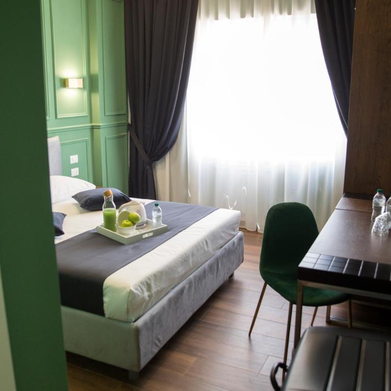 Unicum Roma Suites - Camera Deluxe - 1