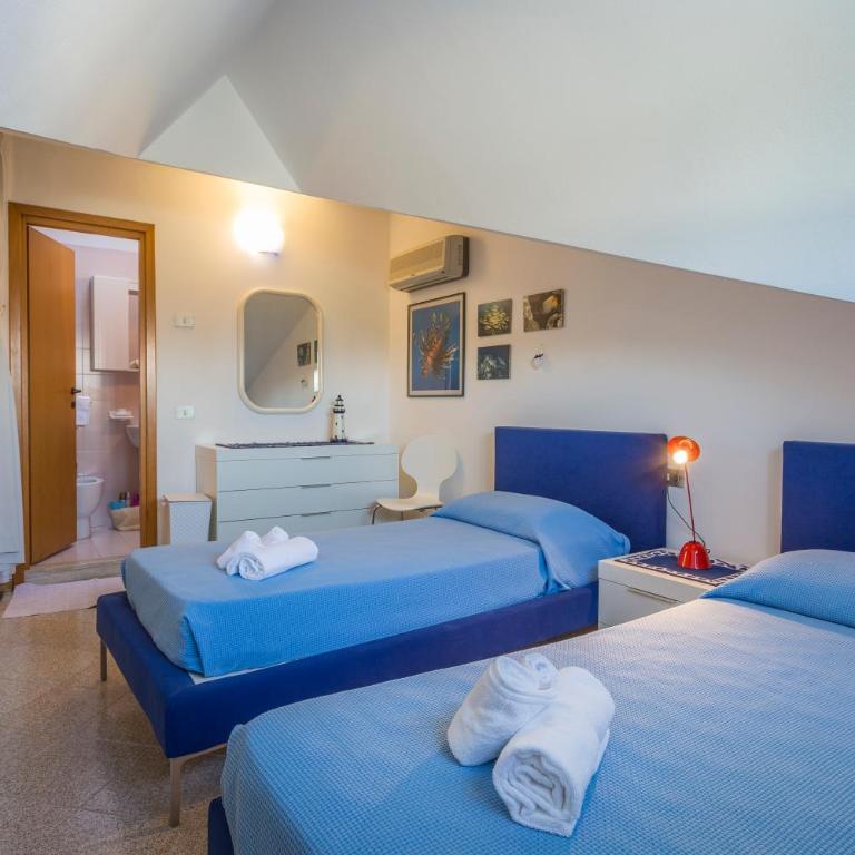 GuestHost - Lignano Sabbiadoro Flat Garage - Two-Bedroom Apartment - 8